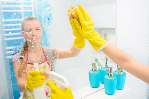 Sanitized high-touch surfaces in a workplace environment