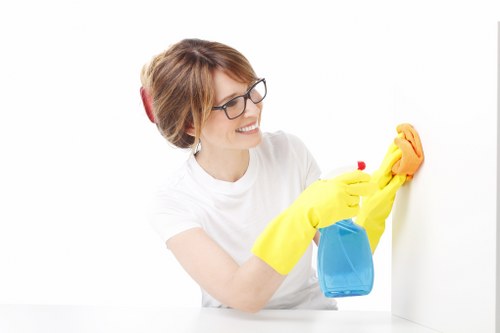 Cleaning team working on shared area maintenance in a modern property